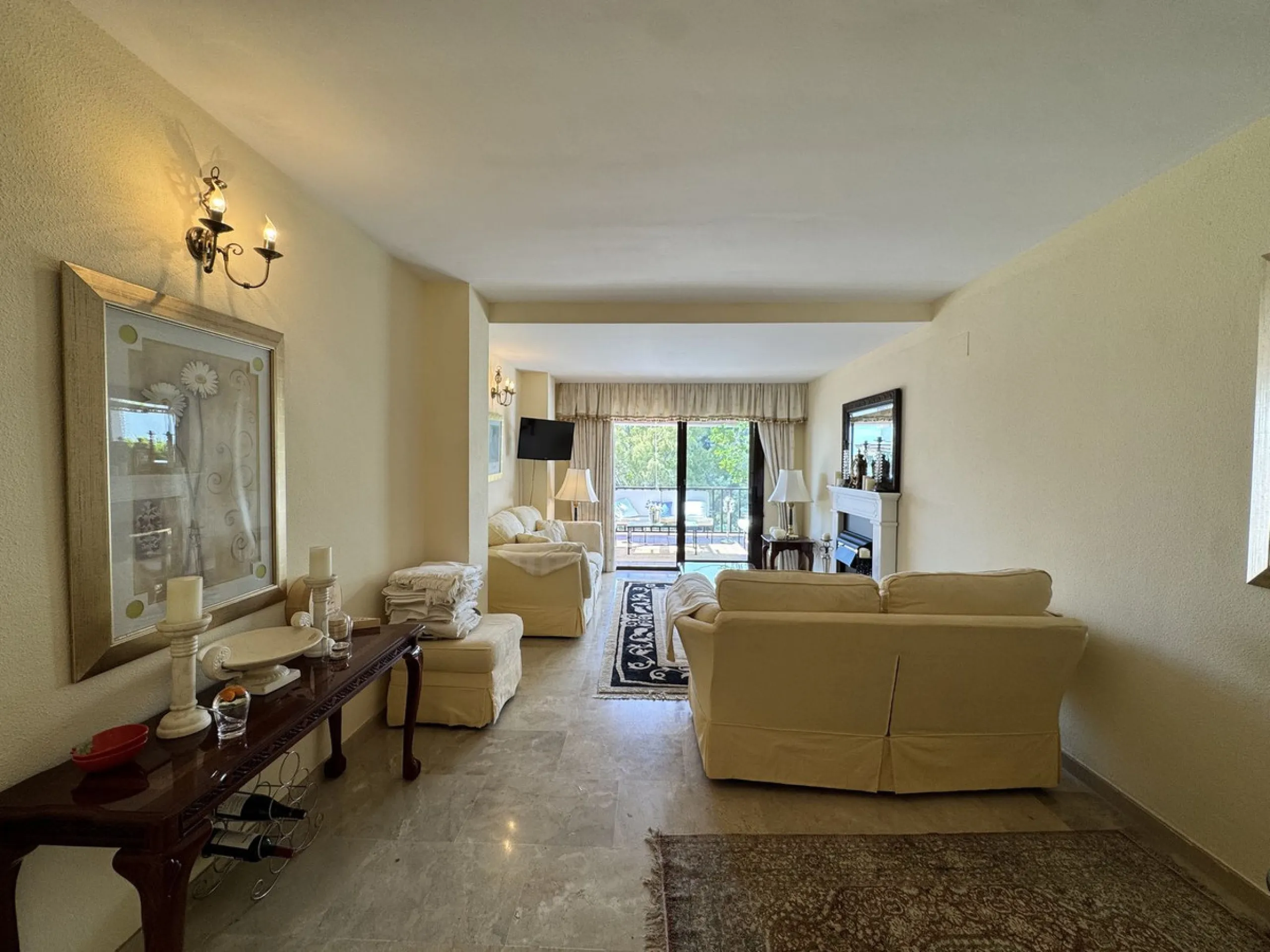 Located in the sought after Coto Real on the prestigious Marbella Golden Mile, this charming 2-bedroom, 2-bathroom apartment offers privacy, tranquility, and excellent potential in one of Marbella's most established gated communities.
