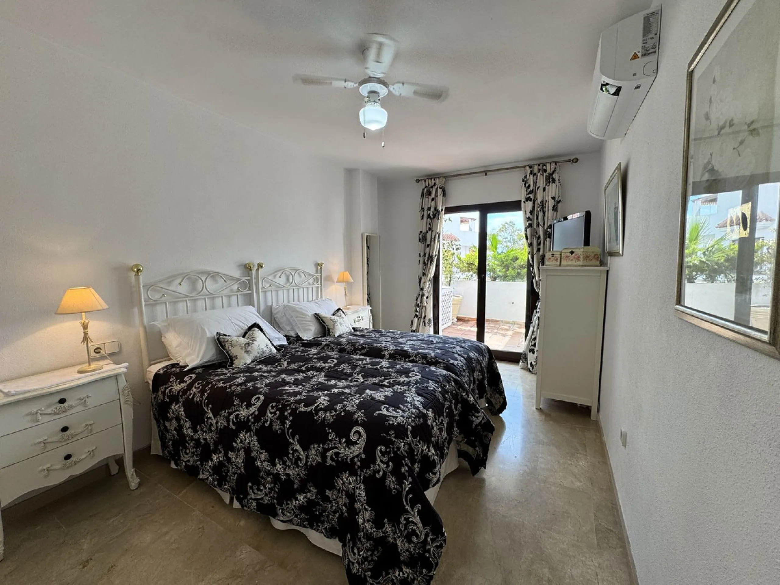 Located in the sought after Coto Real on the prestigious Marbella Golden Mile, this charming 2-bedroom, 2-bathroom apartment offers privacy, tranquility, and excellent potential in one of Marbella's most established gated communities.