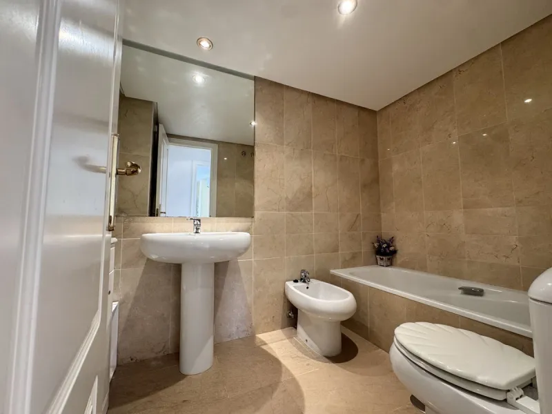 Located in the sought after Coto Real on the prestigious Marbella Golden Mile, this charming 2-bedroom, 2-bathroom apartment offers privacy, tranquility, and excellent potential in one of Marbella's most established gated communities.