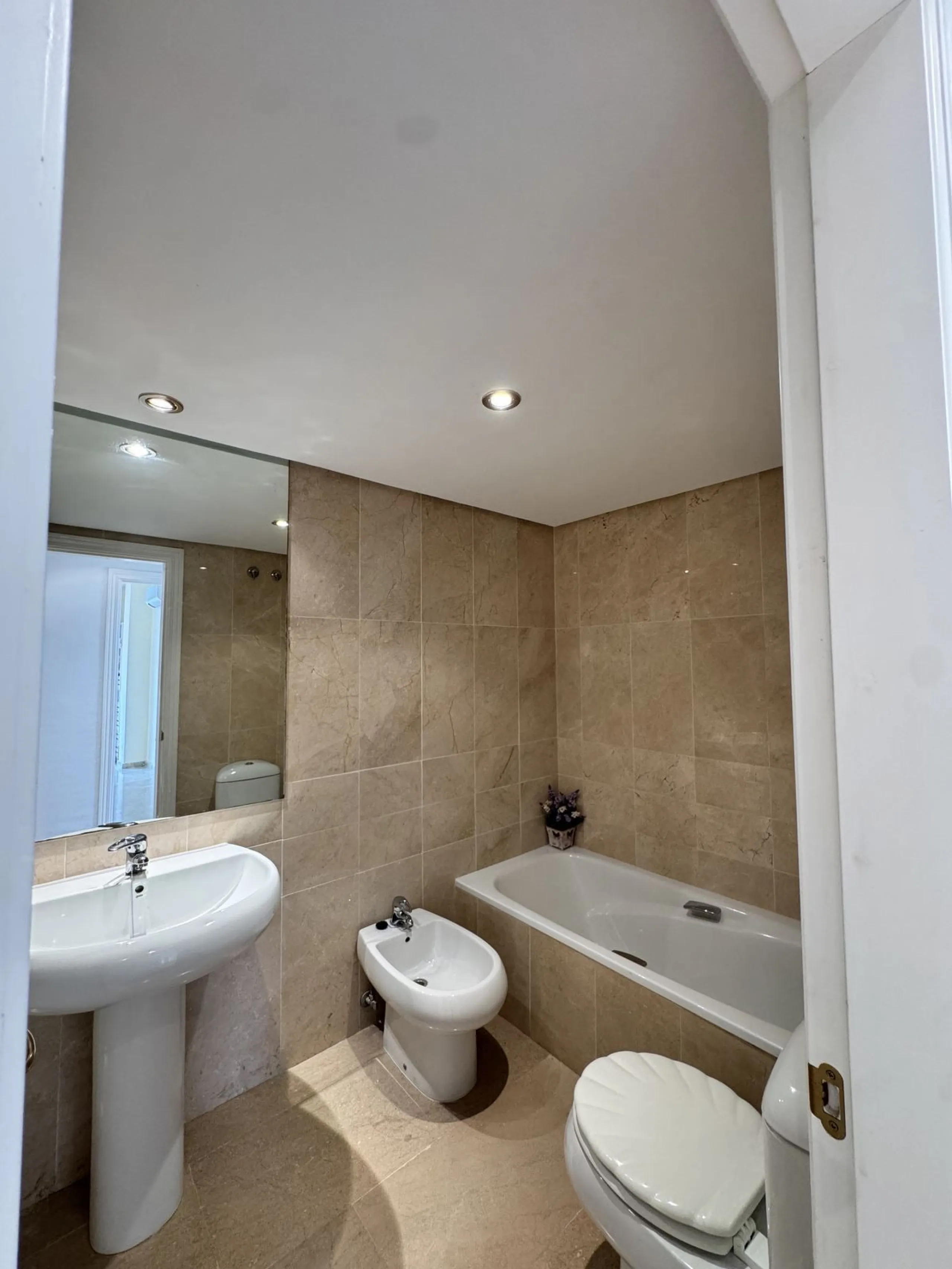 Located in the sought after Coto Real on the prestigious Marbella Golden Mile, this charming 2-bedroom, 2-bathroom apartment offers privacy, tranquility, and excellent potential in one of Marbella's most established gated communities.