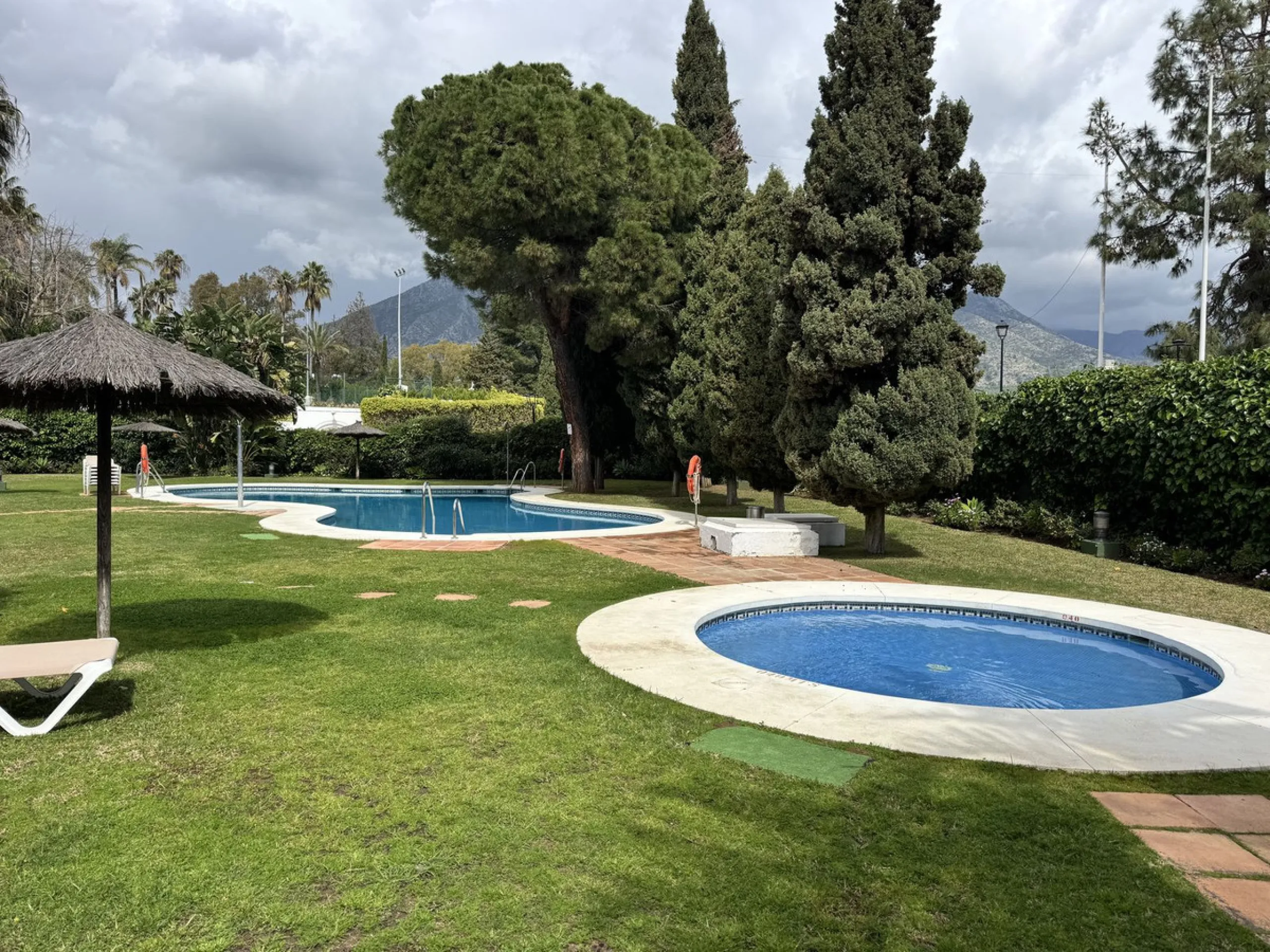 Located in the sought after Coto Real on the prestigious Marbella Golden Mile, this charming 2-bedroom, 2-bathroom apartment offers privacy, tranquility, and excellent potential in one of Marbella's most established gated communities.