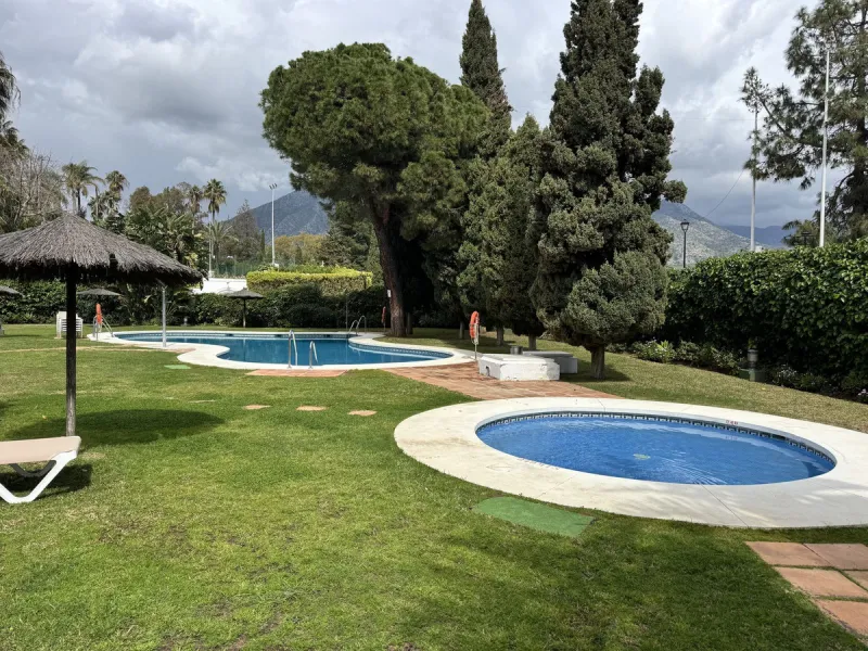 Located in the sought after Coto Real on the prestigious Marbella Golden Mile, this charming 2-bedroom, 2-bathroom apartment offers privacy, tranquility, and excellent potential in one of Marbella's most established gated communities.