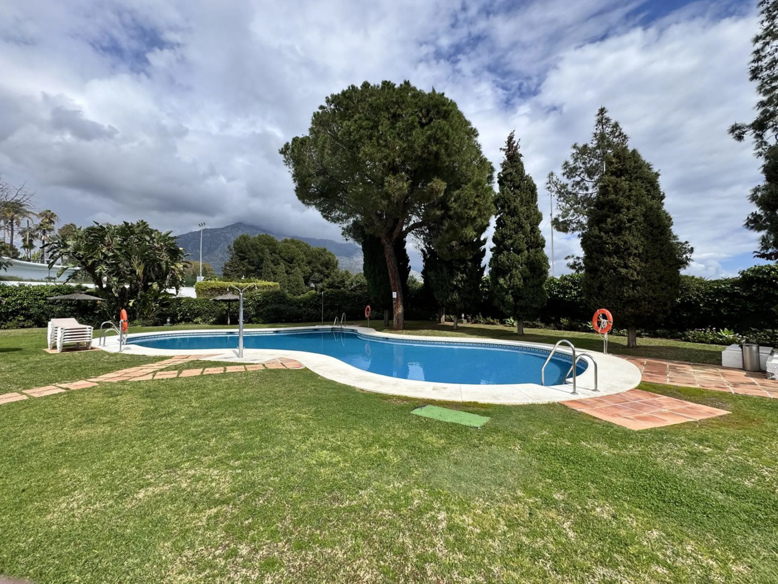 Located in the sought after Coto Real on the prestigious Marbella Golden Mile, this charming 2-bedroom, 2-bathroom apartment offers privacy, tranquility, and excellent potential in one of Marbella's most established gated communities.