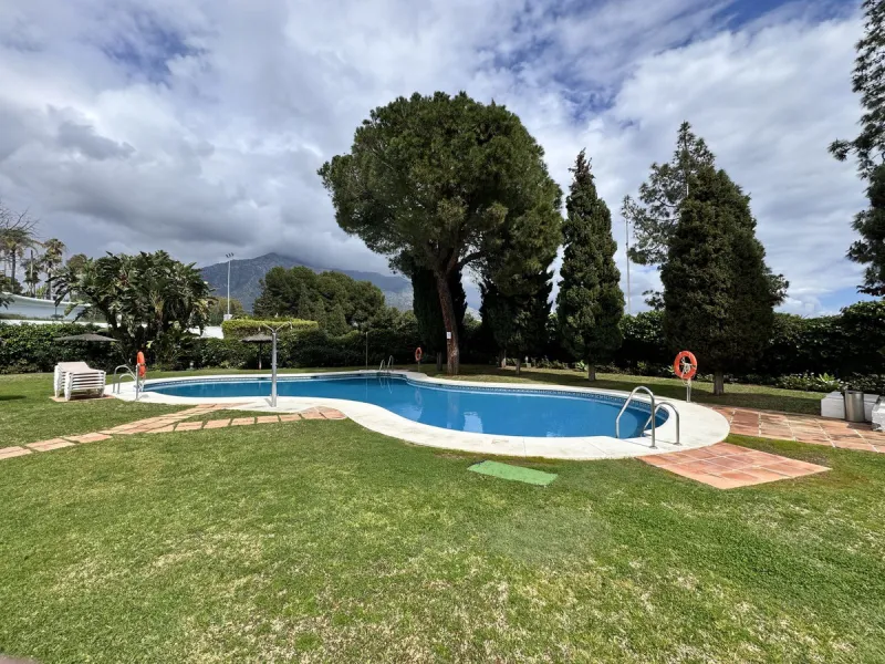 Located in the sought after Coto Real on the prestigious Marbella Golden Mile, this charming 2-bedroom, 2-bathroom apartment offers privacy, tranquility, and excellent potential in one of Marbella's most established gated communities.