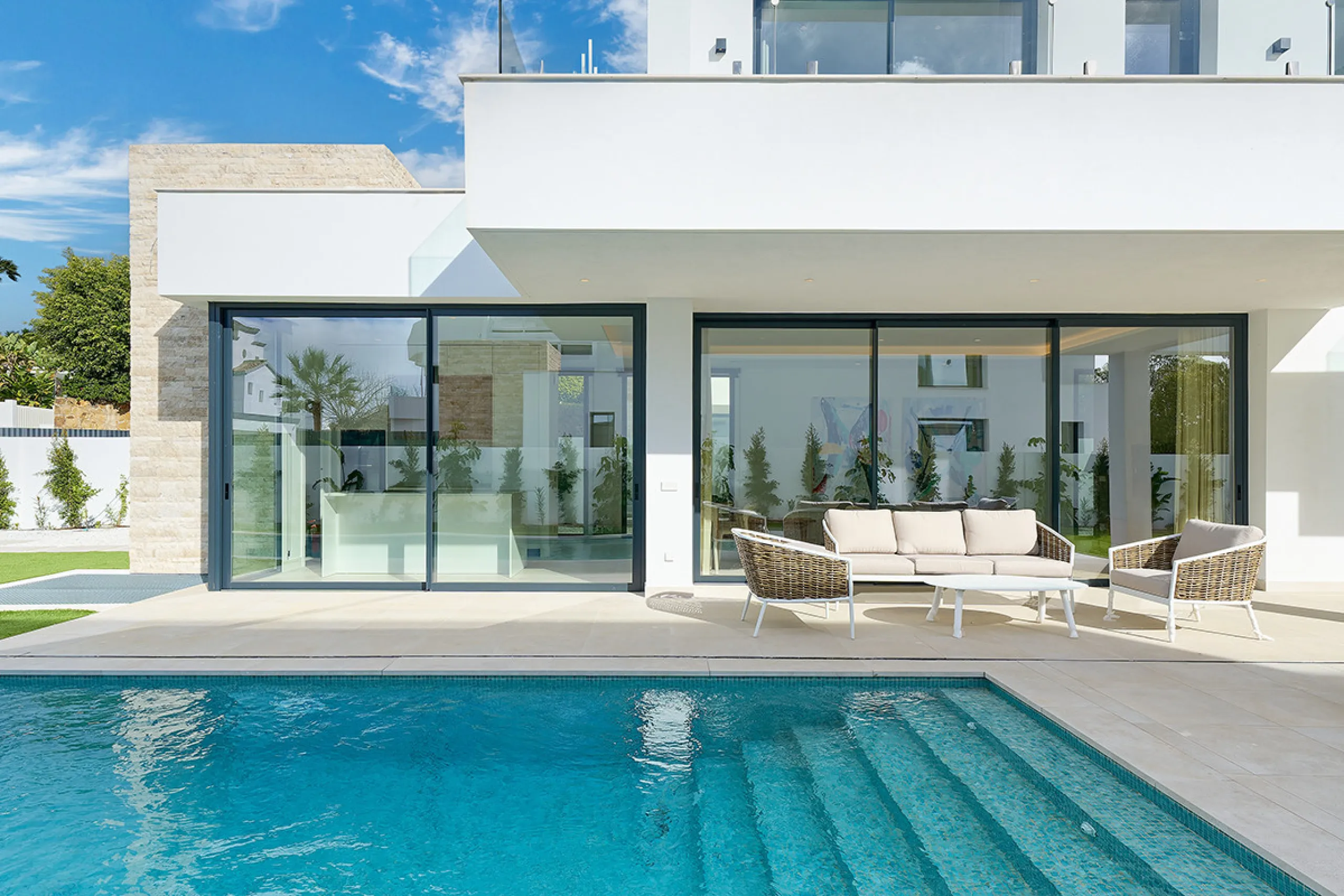 Located in the established residential area of Monte Biarritz, these two contemporary neighbouring villas offer modern Mediterranean living in a quiet yet highly connected setting between Marbella and Estepona. Designed with clean architectural lines and 