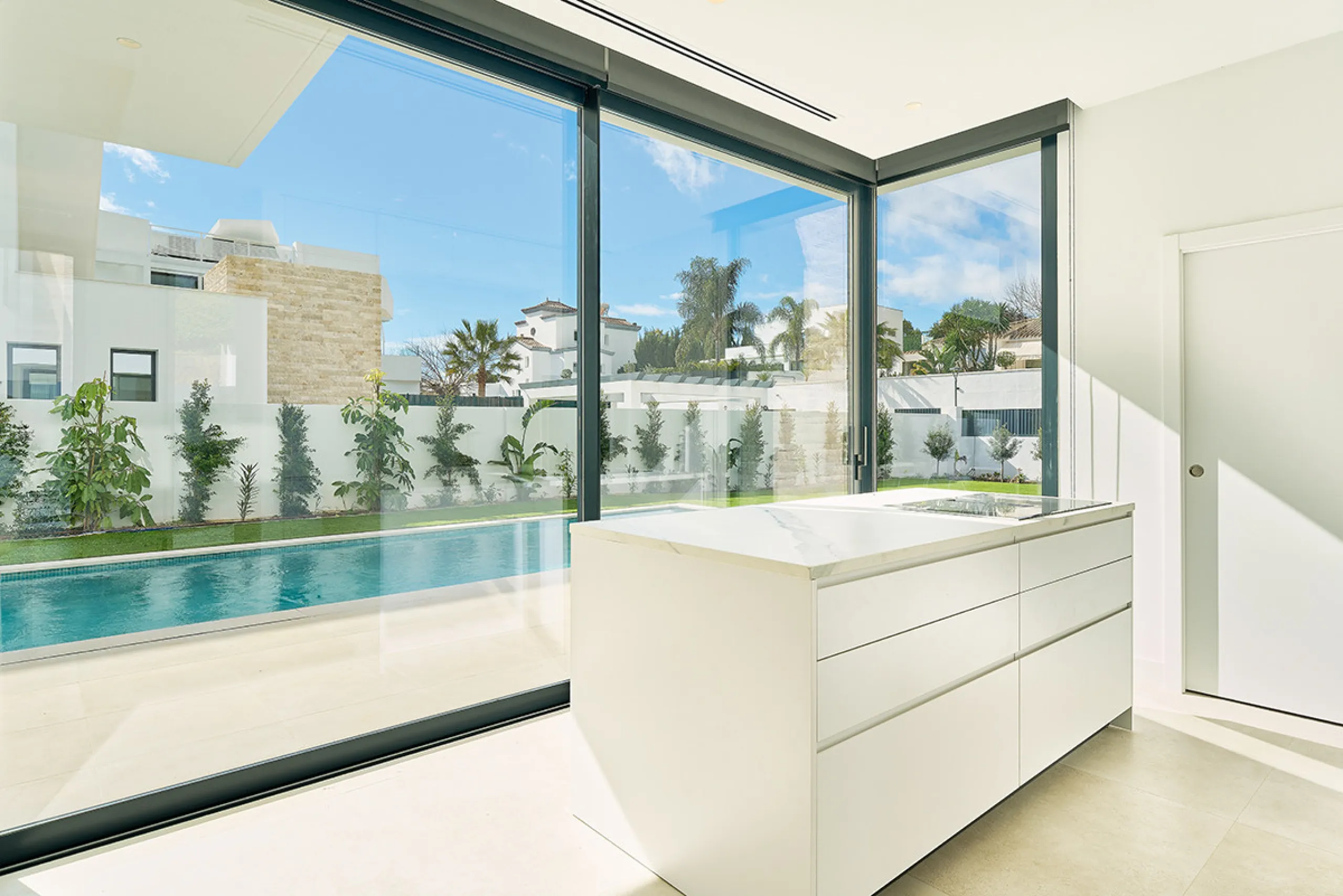 Located in the established residential area of Monte Biarritz, these two contemporary neighbouring villas offer modern Mediterranean living in a quiet yet highly connected setting between Marbella and Estepona. Designed with clean architectural lines and 
