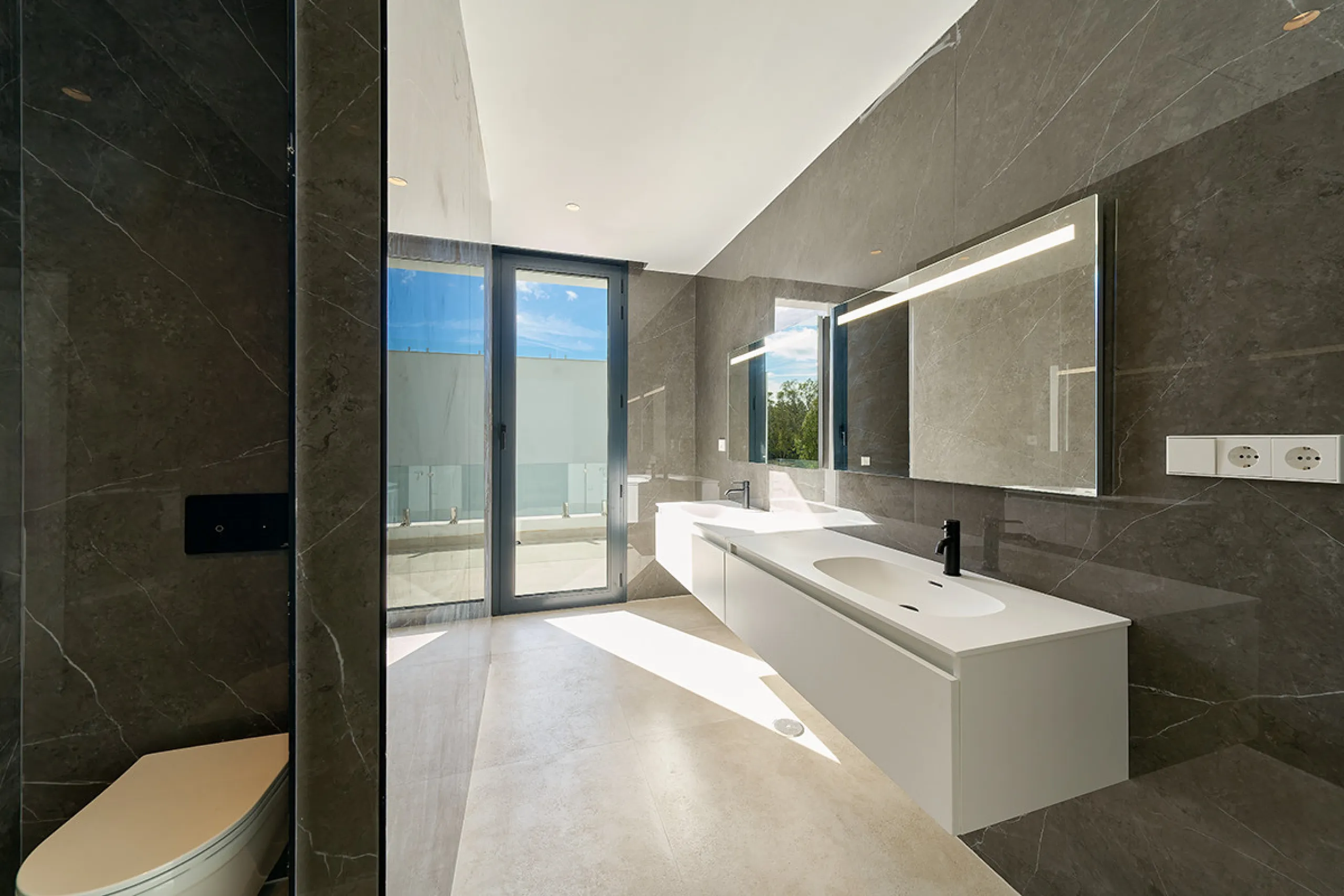 Located in the established residential area of Monte Biarritz, these two contemporary neighbouring villas offer modern Mediterranean living in a quiet yet highly connected setting between Marbella and Estepona. Designed with clean architectural lines and 