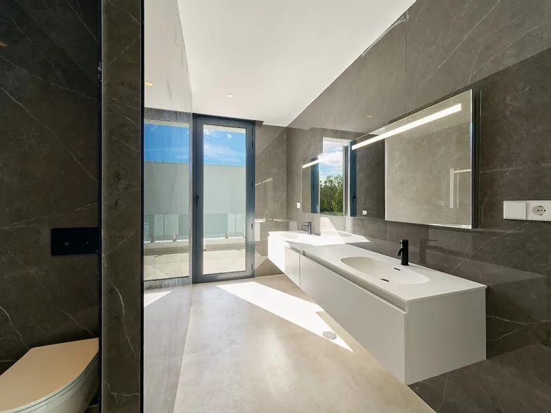 Located in the established residential area of Monte Biarritz, these two contemporary neighbouring villas offer modern Mediterranean living in a quiet yet highly connected setting between Marbella and Estepona. Designed with clean architectural lines and 
