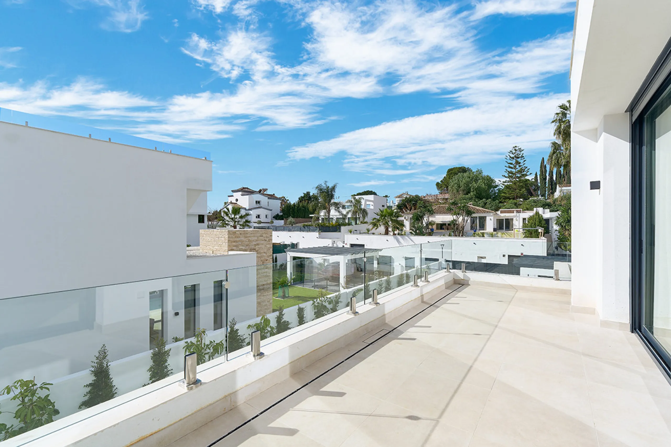 Located in the established residential area of Monte Biarritz, these two contemporary neighbouring villas offer modern Mediterranean living in a quiet yet highly connected setting between Marbella and Estepona. Designed with clean architectural lines and 