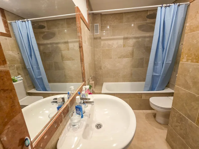 2-bedroom beachfront apartment with terrace, sea views, gardens, and pool, in the best urbanization of Sabinillas, in an unbeatable location within walking distance of all amenities.