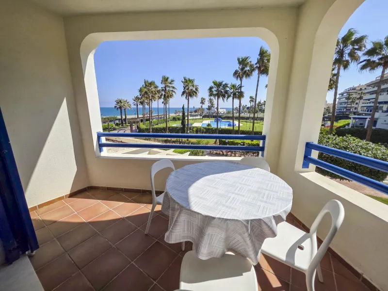 2-bedroom beachfront apartment with terrace, sea views, gardens, and pool, in the best urbanization of Sabinillas, in an unbeatable location within walking distance of all amenities.