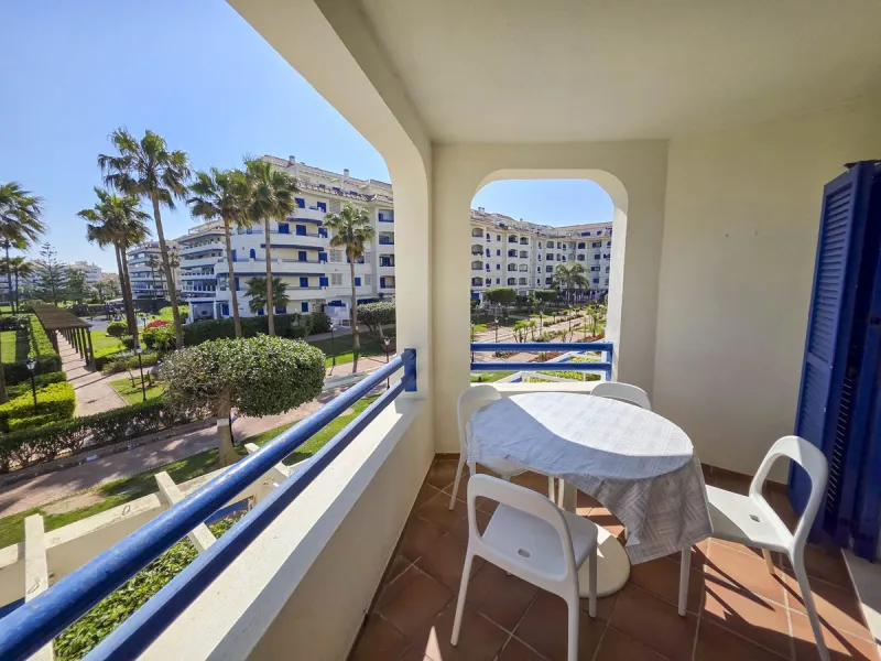 2-bedroom beachfront apartment with terrace, sea views, gardens, and pool, in the best urbanization of Sabinillas, in an unbeatable location within walking distance of all amenities.
