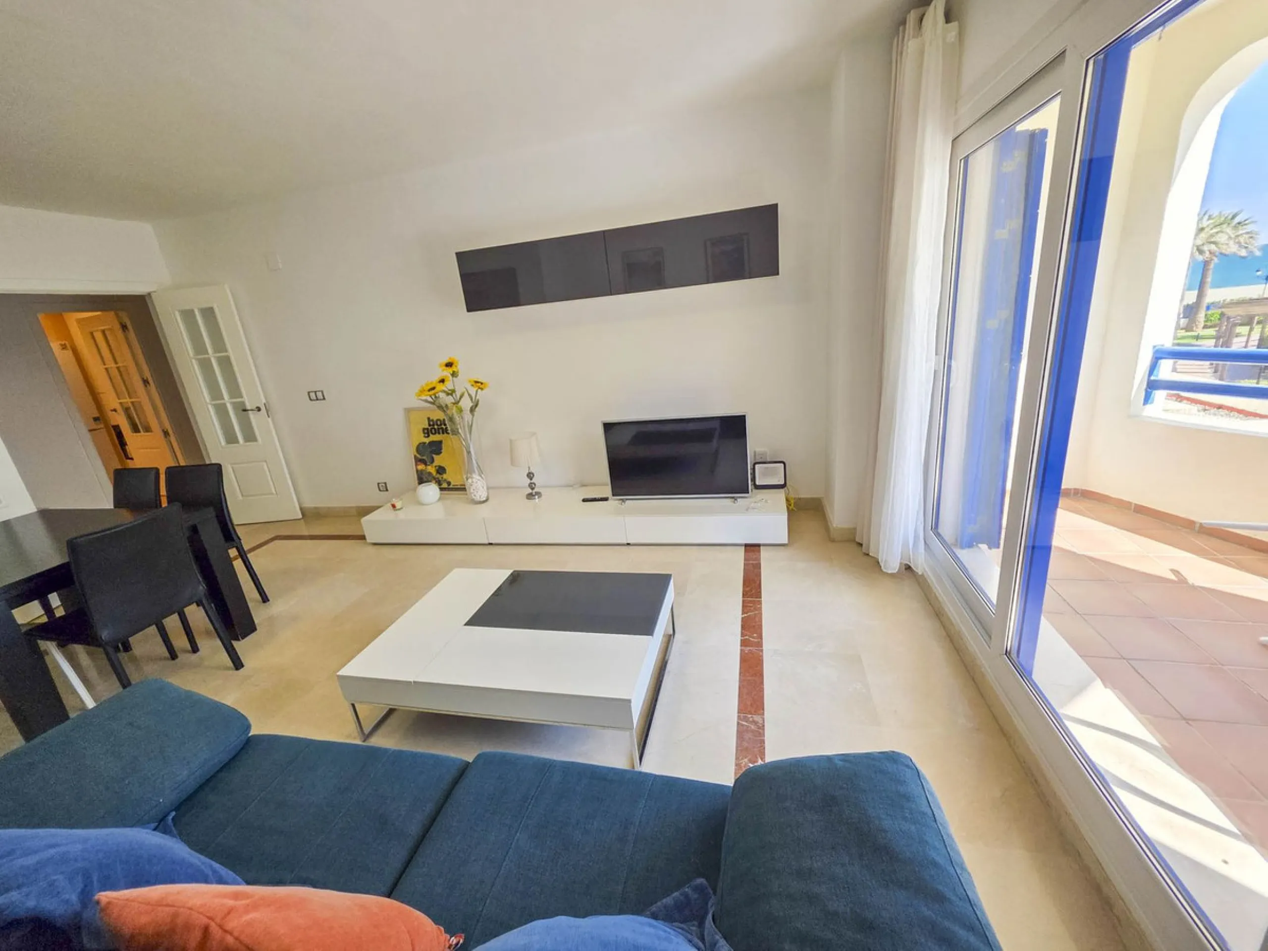 2-bedroom beachfront apartment with terrace, sea views, gardens, and pool, in the best urbanization of Sabinillas, in an unbeatable location within walking distance of all amenities.