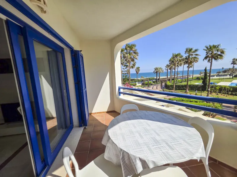 2-bedroom beachfront apartment with terrace, sea views, gardens, and pool, in the best urbanization of Sabinillas, in an unbeatable location within walking distance of all amenities.