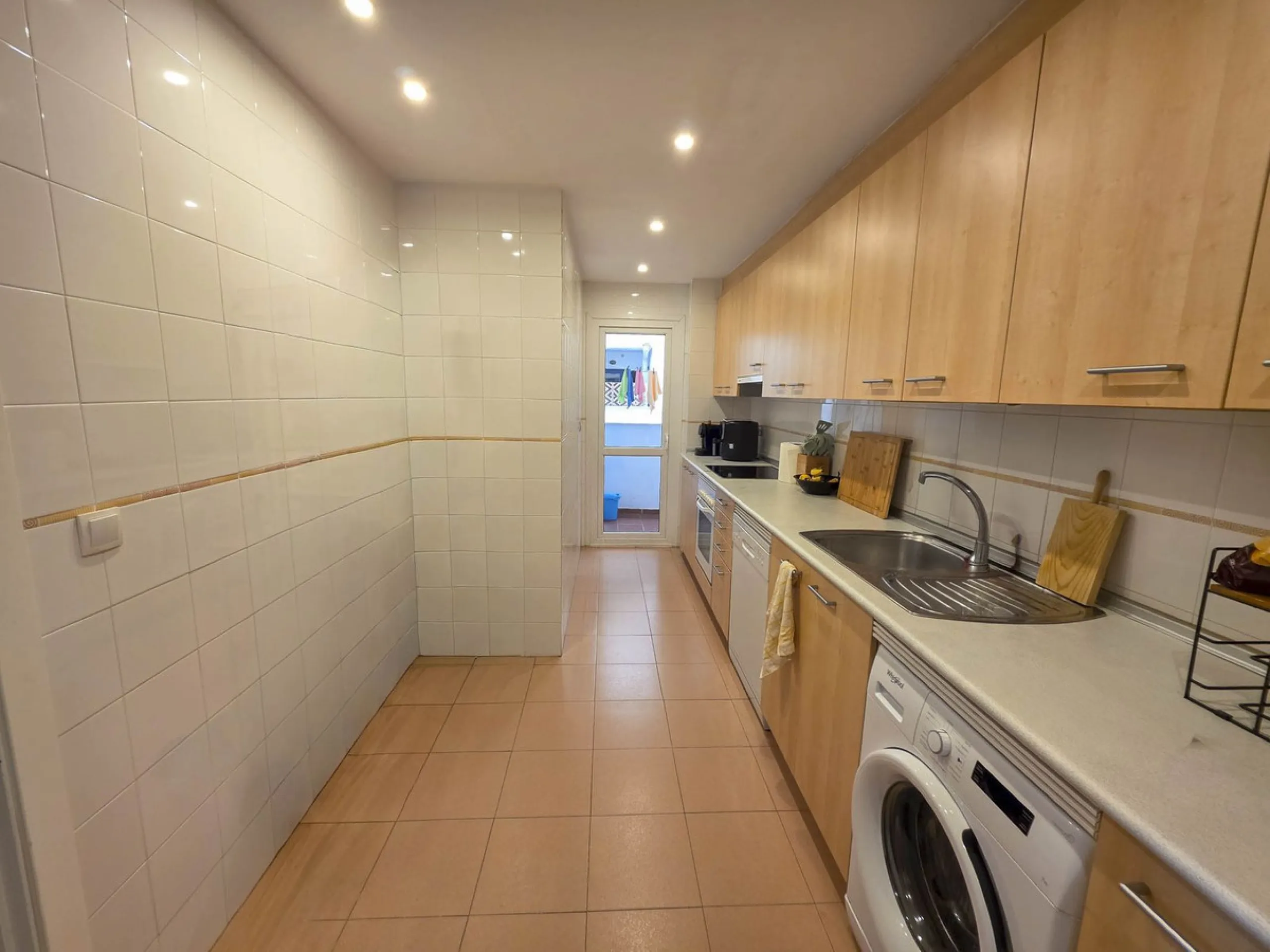 2-bedroom beachfront apartment with terrace, sea views, gardens, and pool, in the best urbanization of Sabinillas, in an unbeatable location within walking distance of all amenities.