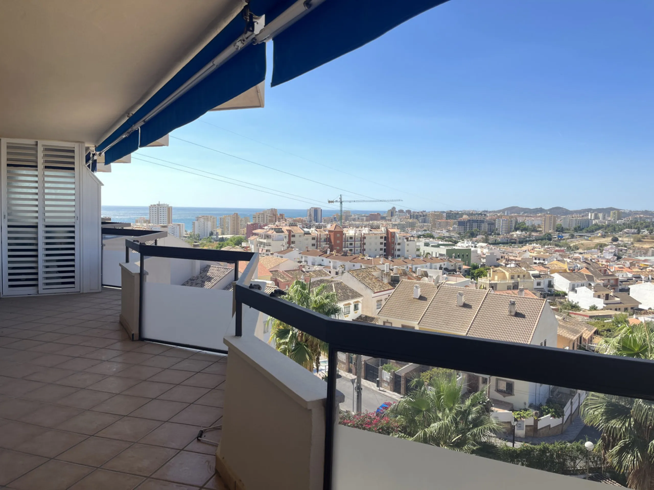 Experience the rare sense of space and openness in this beautifully renovated apartment, created by merging two separate units into one generous and well-designed home. This property offers panoramic views of the Mediterranean Sea and the surrounding moun