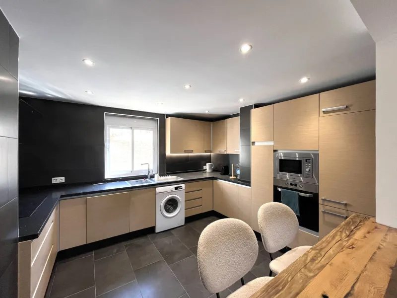 Experience the rare sense of space and openness in this beautifully renovated apartment, created by merging two separate units into one generous and well-designed home. This property offers panoramic views of the Mediterranean Sea and the surrounding moun