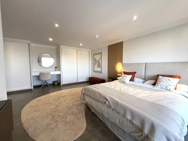 Experience the rare sense of space and openness in this beautifully renovated apartment, created by merging two separate units into one generous and well-designed home. This property offers panoramic views of the Mediterranean Sea and the surrounding moun