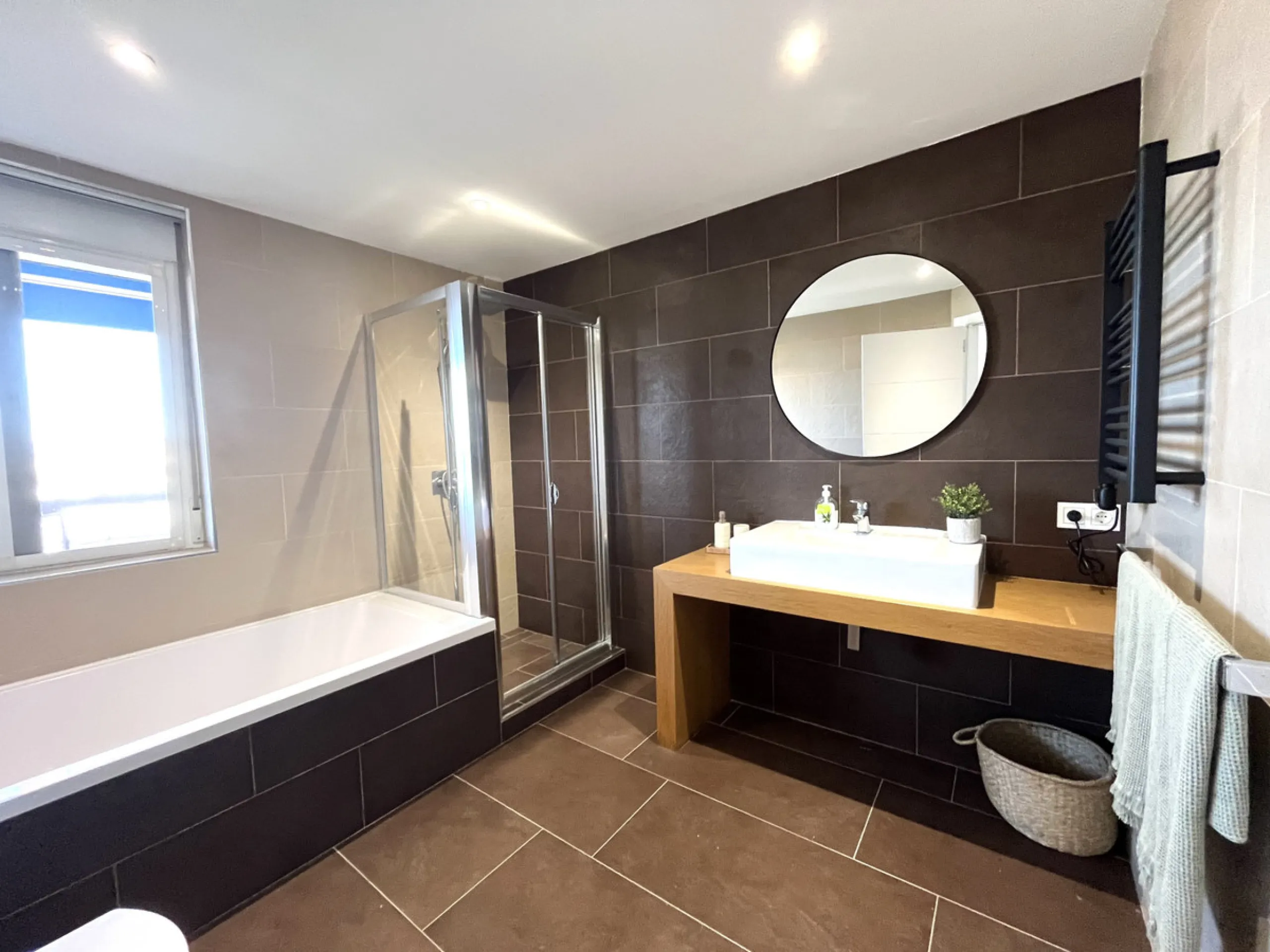 Experience the rare sense of space and openness in this beautifully renovated apartment, created by merging two separate units into one generous and well-designed home. This property offers panoramic views of the Mediterranean Sea and the surrounding moun