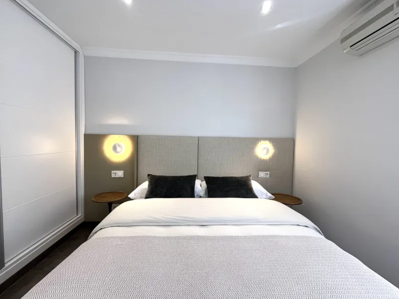 Experience the rare sense of space and openness in this beautifully renovated apartment, created by merging two separate units into one generous and well-designed home. This property offers panoramic views of the Mediterranean Sea and the surrounding moun