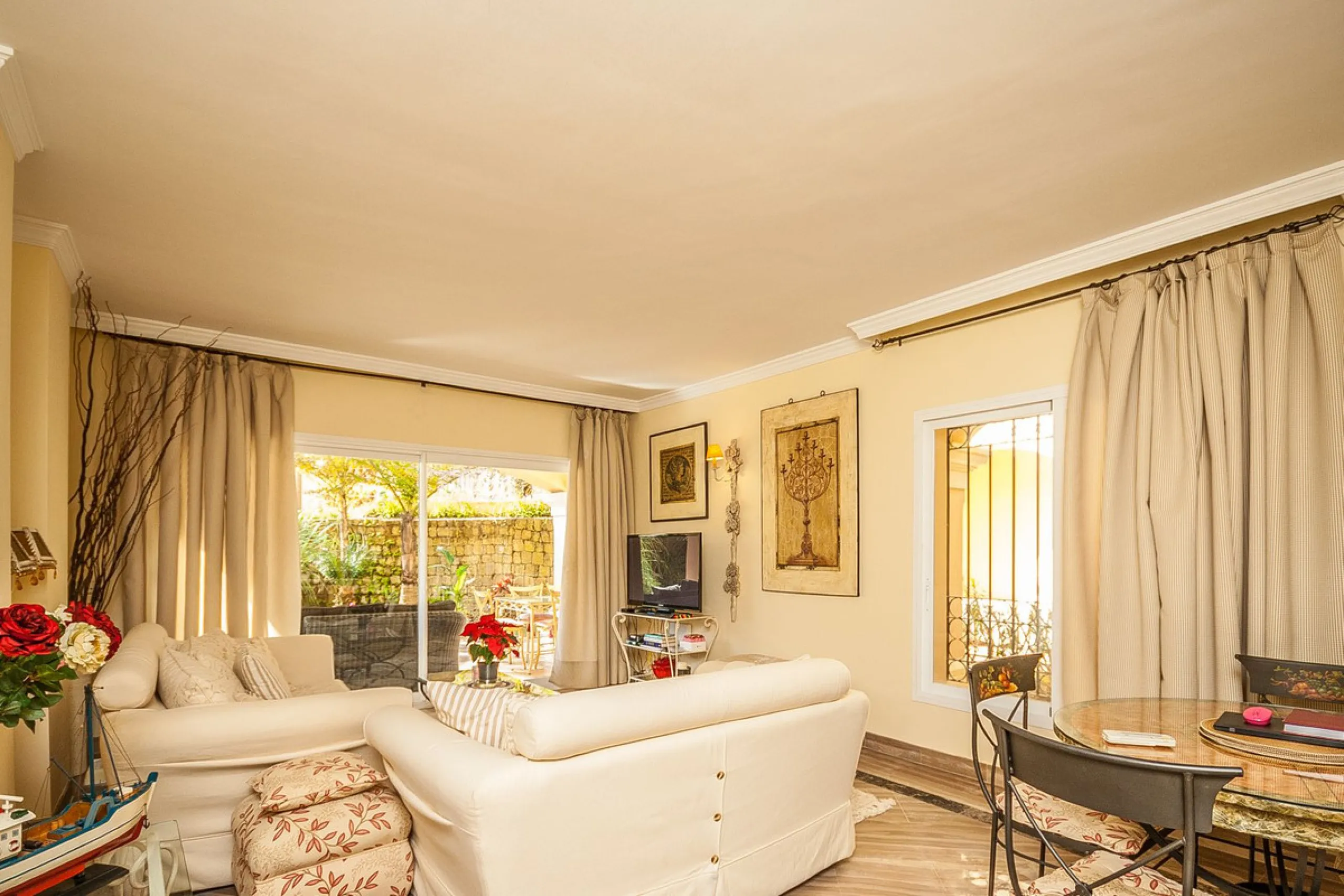 Discover your dream retreat in this stunning garden apartment, ideally situated just a short stroll from vibrant shops and the pristine beach. Nestled within a fully gated community, residents enjoy access to four sparkling swimming pools and lush tropica