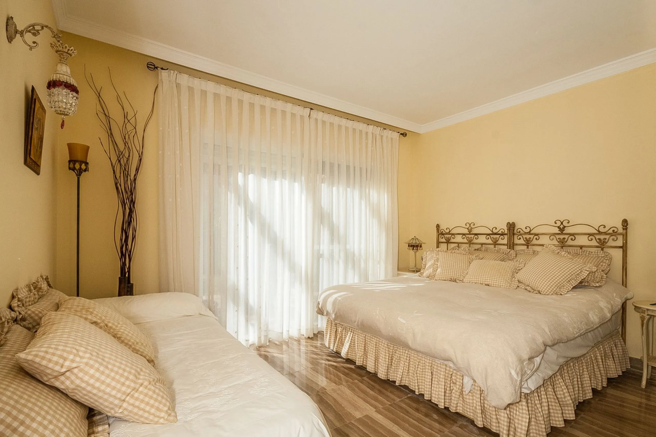 Discover your dream retreat in this stunning garden apartment, ideally situated just a short stroll from vibrant shops and the pristine beach. Nestled within a fully gated community, residents enjoy access to four sparkling swimming pools and lush tropica