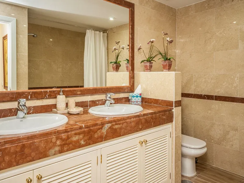 Discover your dream retreat in this stunning garden apartment, ideally situated just a short stroll from vibrant shops and the pristine beach. Nestled within a fully gated community, residents enjoy access to four sparkling swimming pools and lush tropica