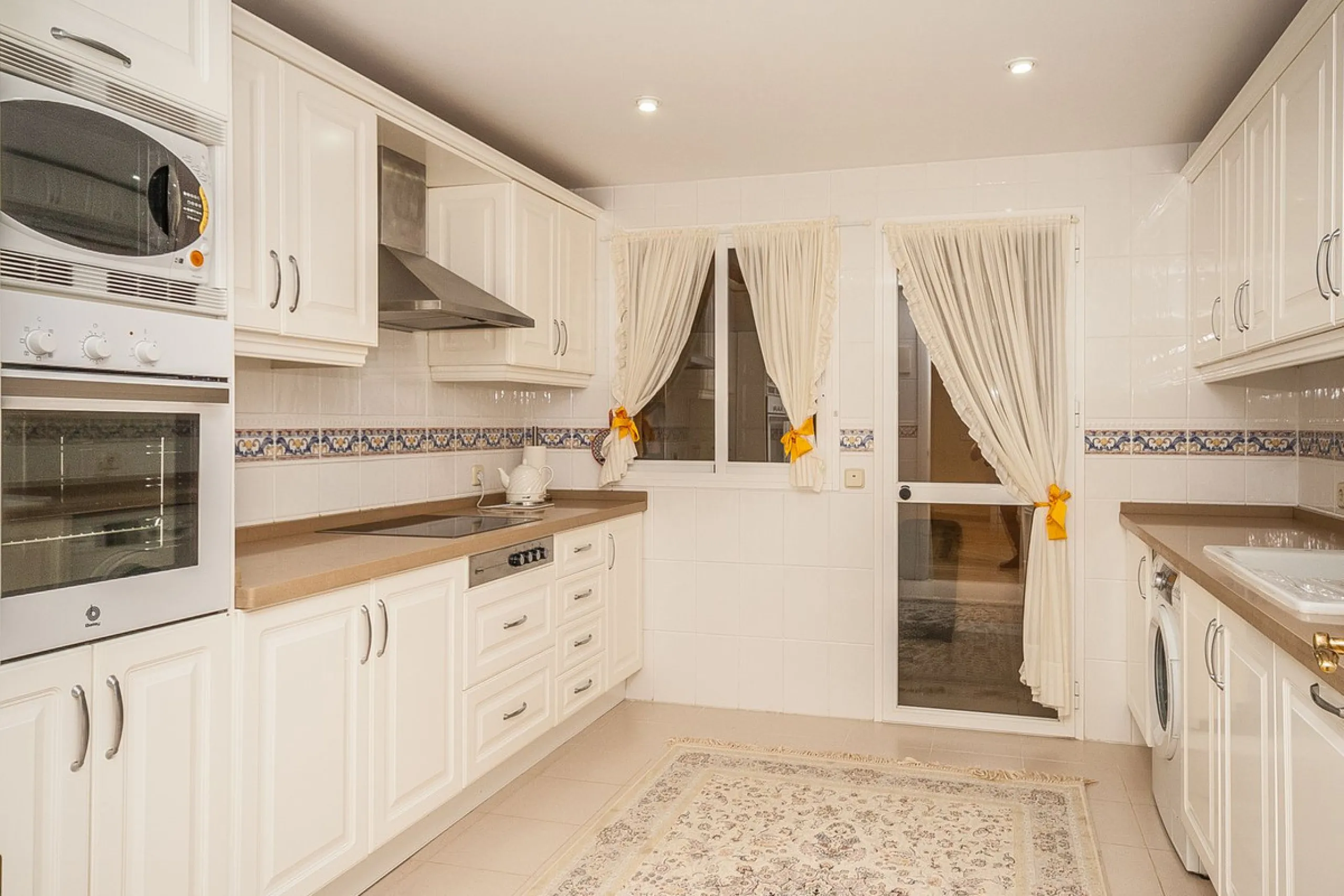 Discover your dream retreat in this stunning garden apartment, ideally situated just a short stroll from vibrant shops and the pristine beach. Nestled within a fully gated community, residents enjoy access to four sparkling swimming pools and lush tropica