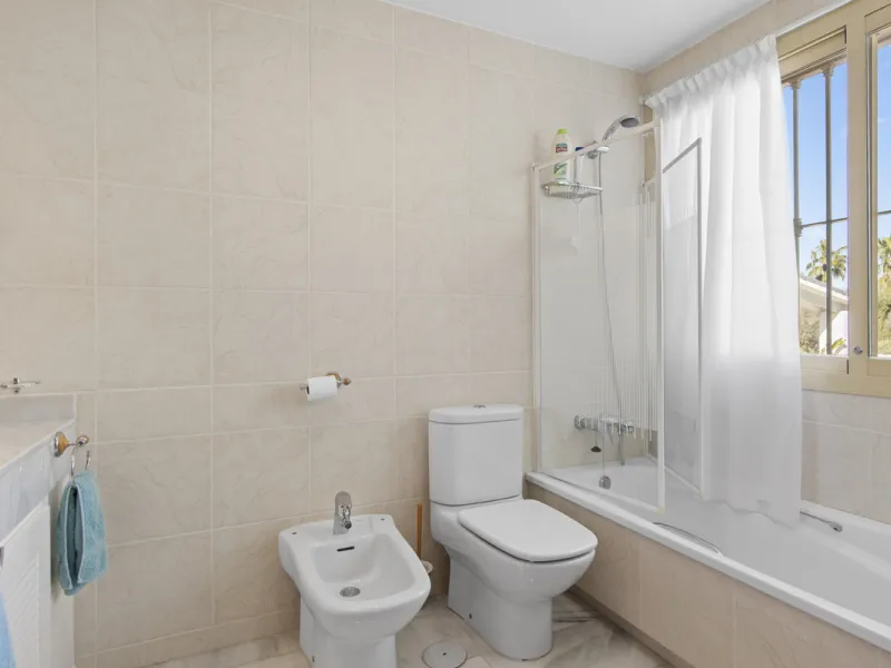This beautifully presented villa is set within a small, secure gated community, offering privacy, peace of mind, and a wonderful sense of exclusivity. Boasting beautiful sea and golf views, the property enjoys a tranquil setting while remaining convenient