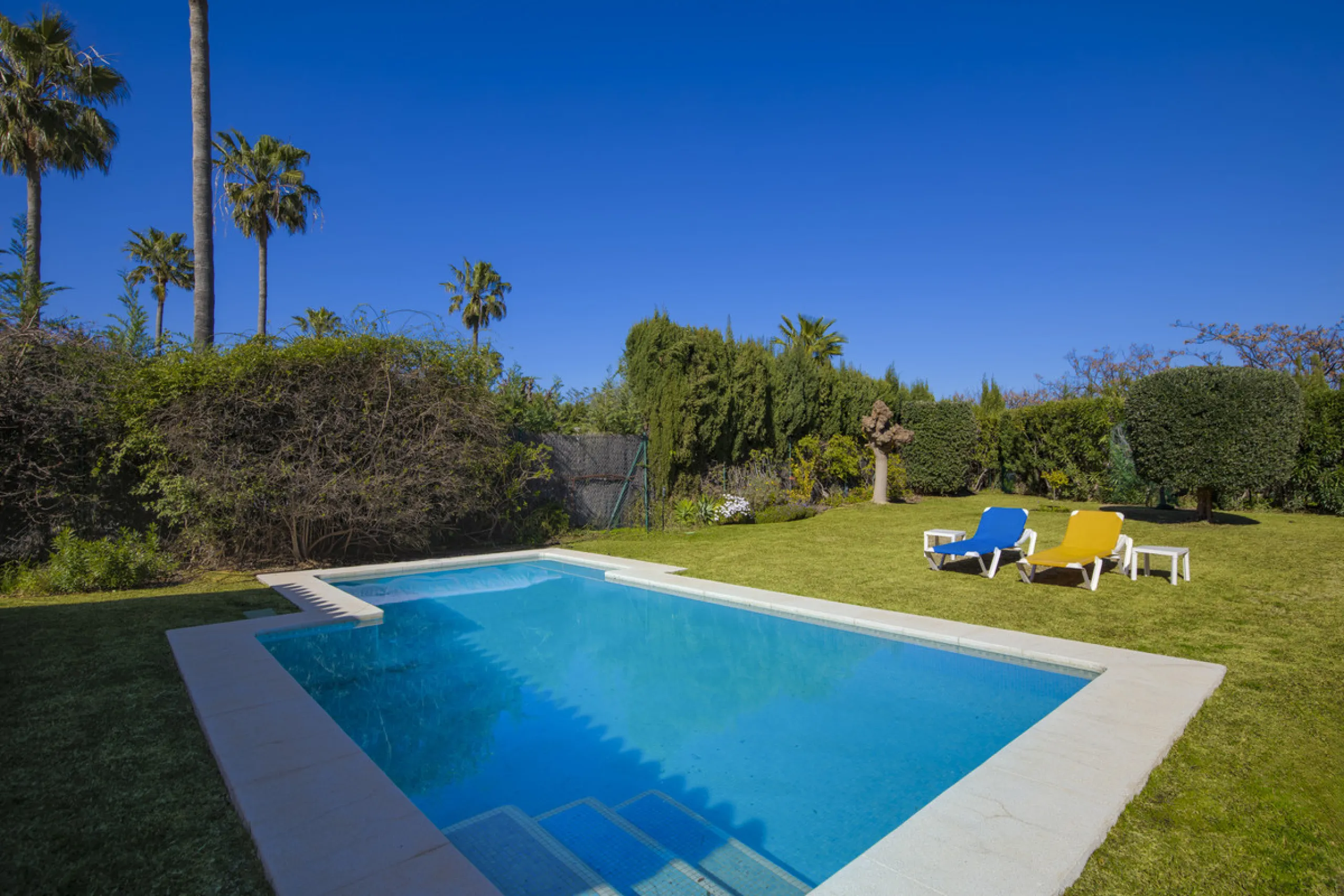 This beautifully presented villa is set within a small, secure gated community, offering privacy, peace of mind, and a wonderful sense of exclusivity. Boasting beautiful sea and golf views, the property enjoys a tranquil setting while remaining convenient