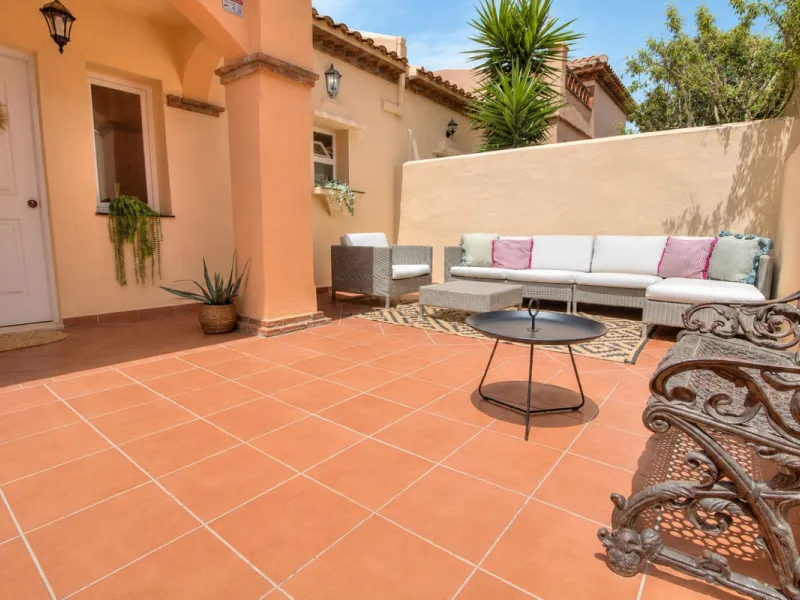 A very comfortable home located in the well established urbanisation of Mijas Golf. This spacious house has bright spacious rooms throughout including, on the top floor, a brand new open plan kitchen, lovely lounge diner with fireplace plus a large bedroo