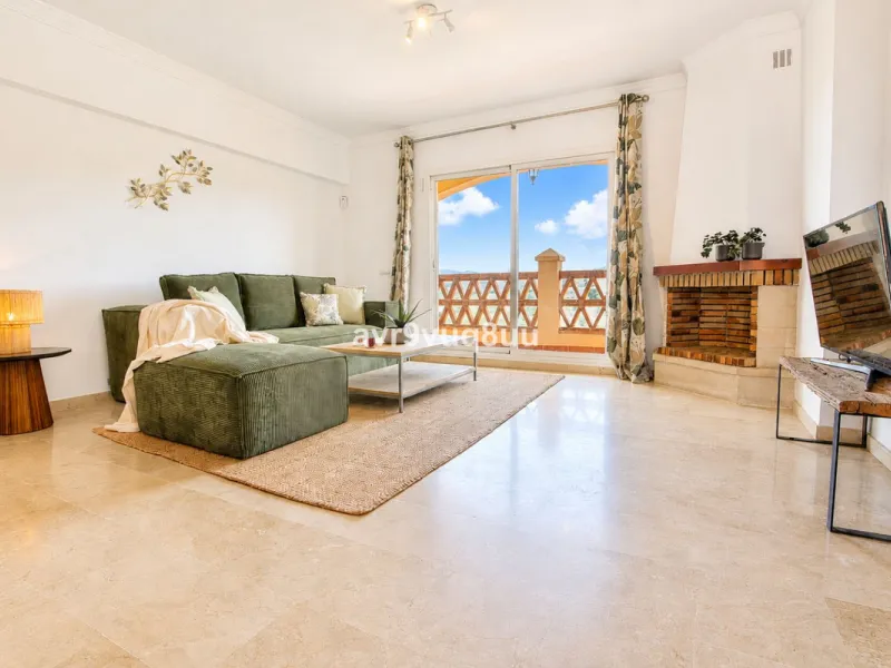 A very comfortable home located in the well established urbanisation of Mijas Golf. This spacious house has bright spacious rooms throughout including, on the top floor, a brand new open plan kitchen, lovely lounge diner with fireplace plus a large bedroo