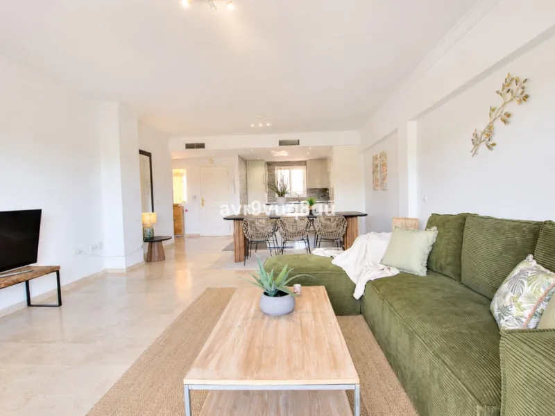 A very comfortable home located in the well established urbanisation of Mijas Golf. This spacious house has bright spacious rooms throughout including, on the top floor, a brand new open plan kitchen, lovely lounge diner with fireplace plus a large bedroo