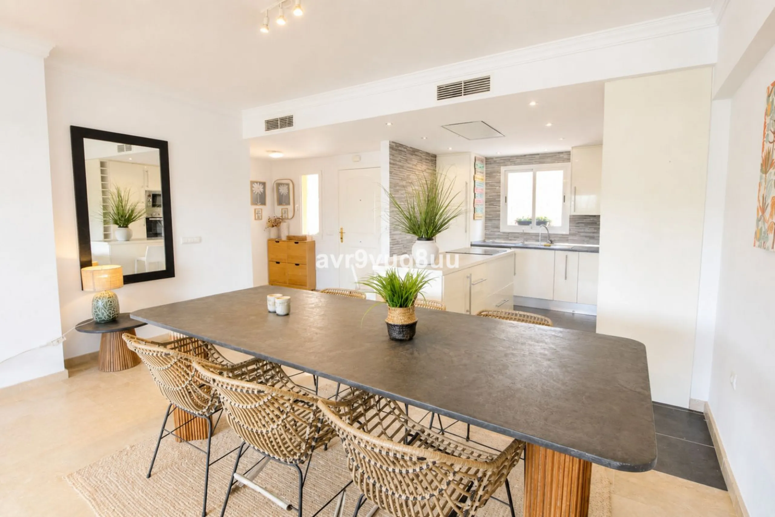 A very comfortable home located in the well established urbanisation of Mijas Golf. This spacious house has bright spacious rooms throughout including, on the top floor, a brand new open plan kitchen, lovely lounge diner with fireplace plus a large bedroo