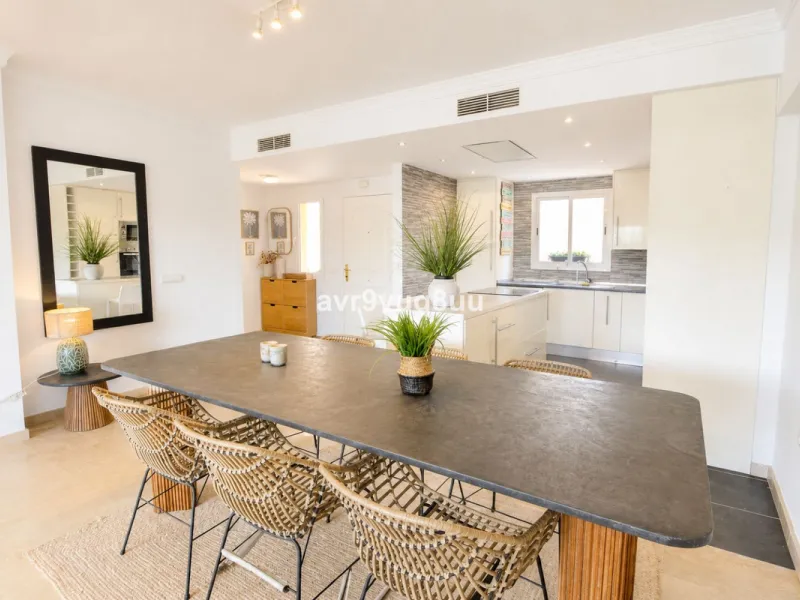 A very comfortable home located in the well established urbanisation of Mijas Golf. This spacious house has bright spacious rooms throughout including, on the top floor, a brand new open plan kitchen, lovely lounge diner with fireplace plus a large bedroo