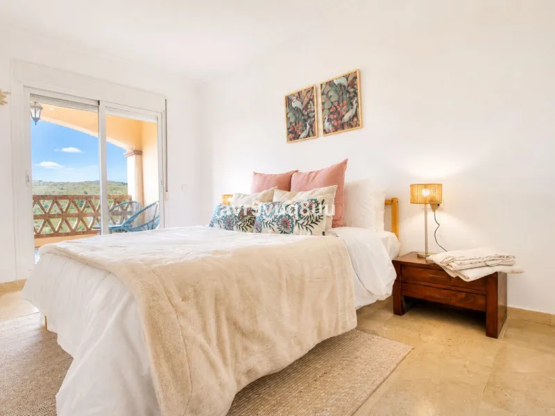 A very comfortable home located in the well established urbanisation of Mijas Golf. This spacious house has bright spacious rooms throughout including, on the top floor, a brand new open plan kitchen, lovely lounge diner with fireplace plus a large bedroo