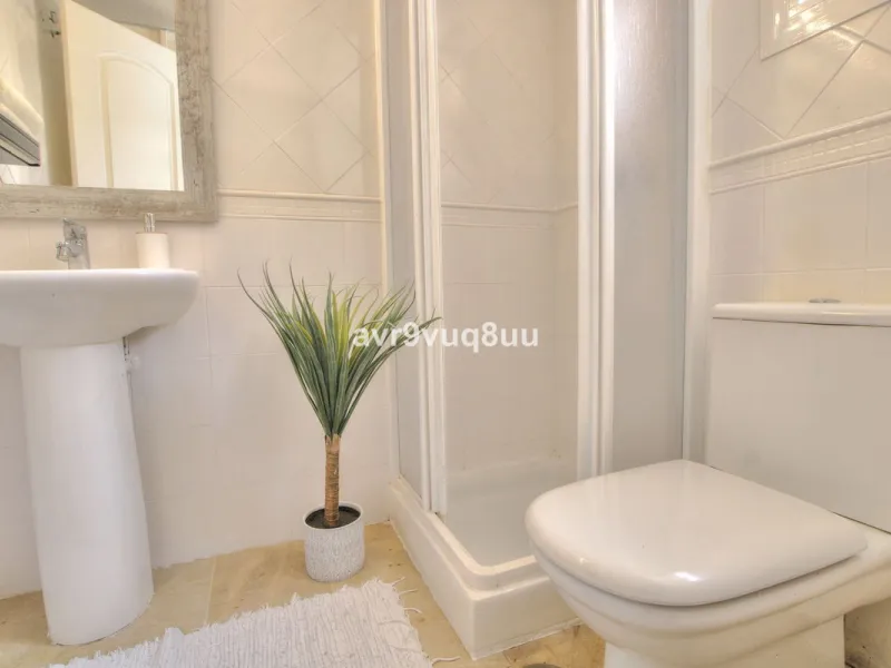 A very comfortable home located in the well established urbanisation of Mijas Golf. This spacious house has bright spacious rooms throughout including, on the top floor, a brand new open plan kitchen, lovely lounge diner with fireplace plus a large bedroo