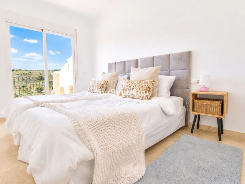 A very comfortable home located in the well established urbanisation of Mijas Golf. This spacious house has bright spacious rooms throughout including, on the top floor, a brand new open plan kitchen, lovely lounge diner with fireplace plus a large bedroo