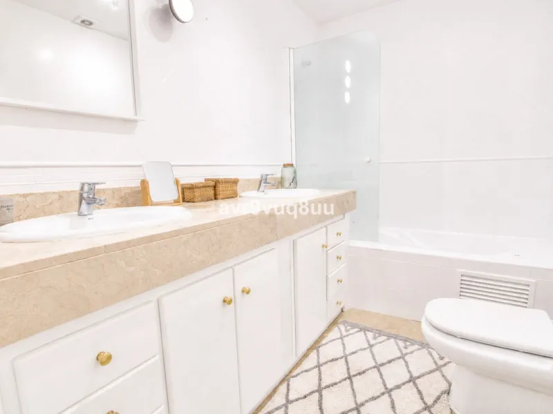 A very comfortable home located in the well established urbanisation of Mijas Golf. This spacious house has bright spacious rooms throughout including, on the top floor, a brand new open plan kitchen, lovely lounge diner with fireplace plus a large bedroo