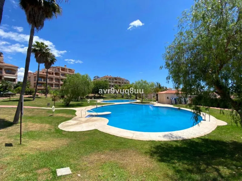 A very comfortable home located in the well established urbanisation of Mijas Golf. This spacious house has bright spacious rooms throughout including, on the top floor, a brand new open plan kitchen, lovely lounge diner with fireplace plus a large bedroo