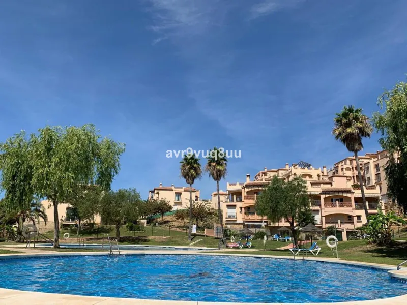 A very comfortable home located in the well established urbanisation of Mijas Golf. This spacious house has bright spacious rooms throughout including, on the top floor, a brand new open plan kitchen, lovely lounge diner with fireplace plus a large bedroo