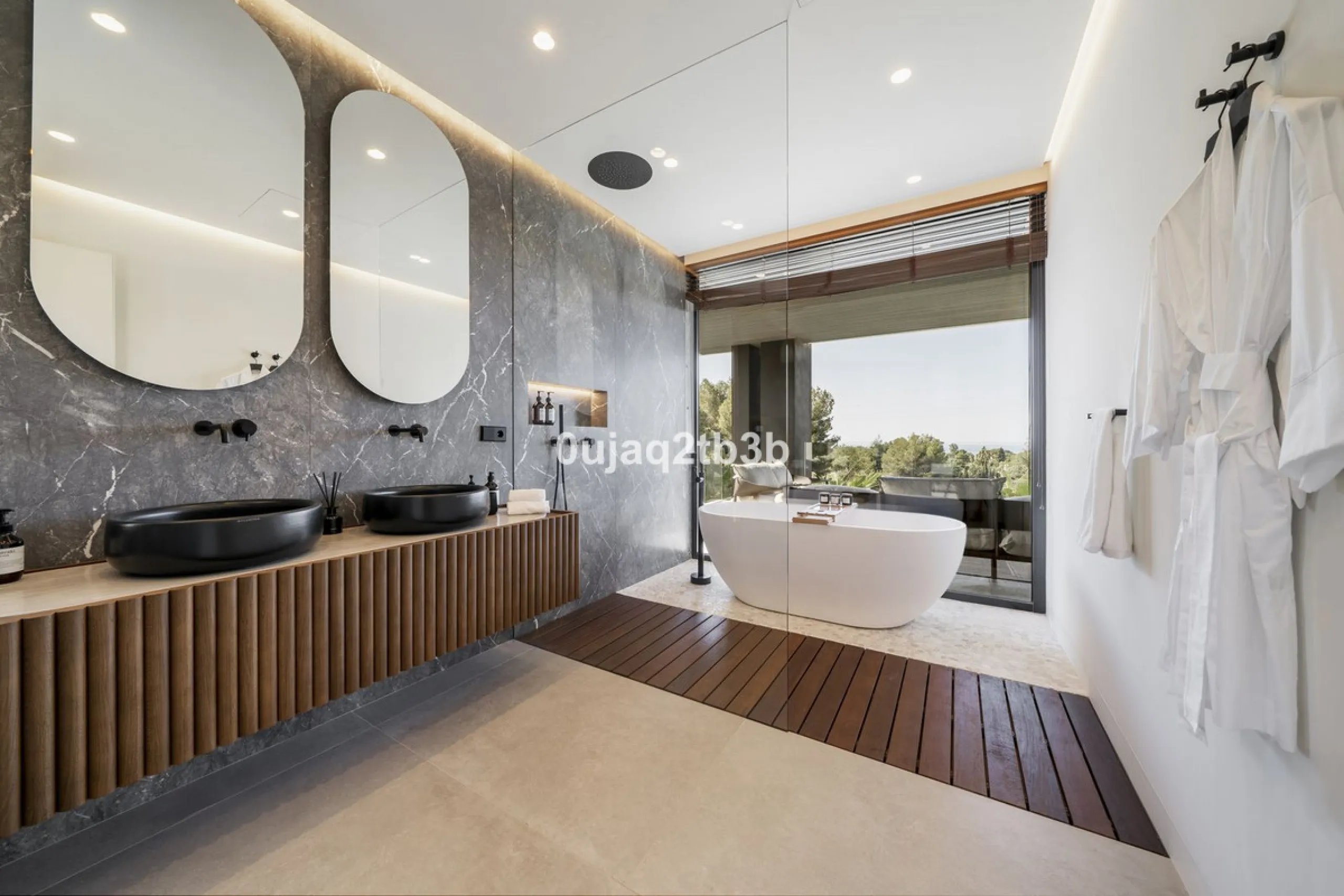 Stunning brand new villa in the best location in Marbella. Perfectly communicated to the main roads that drive you to the airport, Puerto Banús and just a few minutes away from Marbella's center. This state-of-the-art new villa occupies a 1.050m2 plot pos