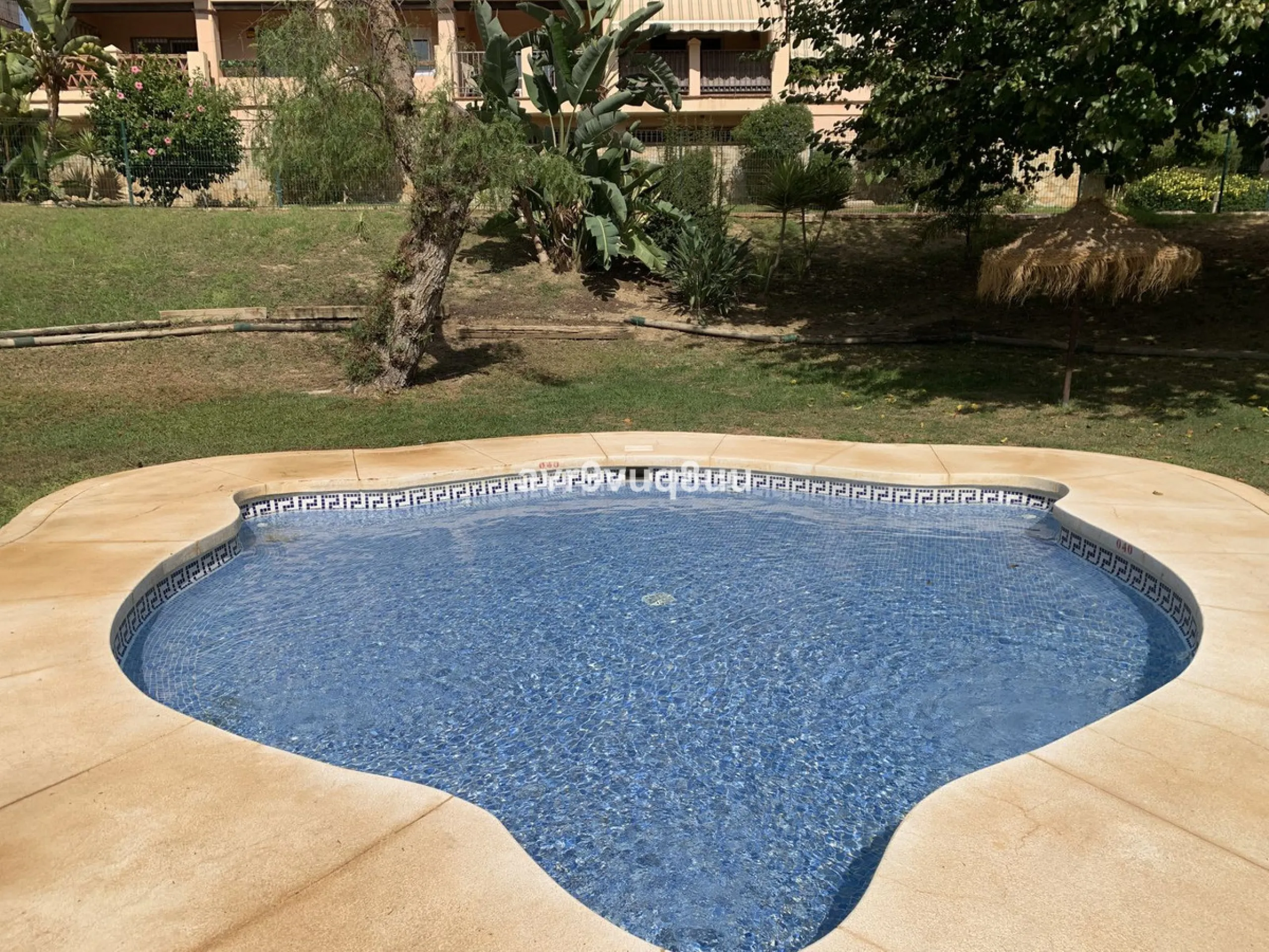 A very comfortable home located in the well established urbanisation of Mijas Golf. This spacious house has bright spacious rooms throughout including, on the top floor, a brand new open plan kitchen, lovely lounge diner with fireplace plus a large bedroo