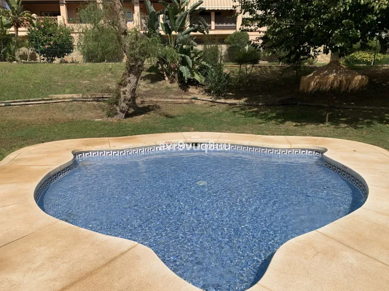 A very comfortable home located in the well established urbanisation of Mijas Golf. This spacious house has bright spacious rooms throughout including, on the top floor, a brand new open plan kitchen, lovely lounge diner with fireplace plus a large bedroo