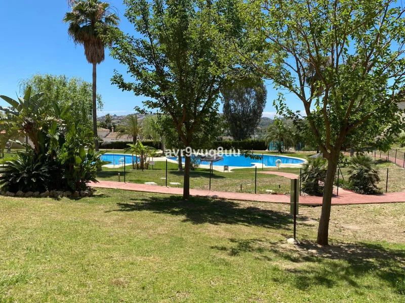 A very comfortable home located in the well established urbanisation of Mijas Golf. This spacious house has bright spacious rooms throughout including, on the top floor, a brand new open plan kitchen, lovely lounge diner with fireplace plus a large bedroo