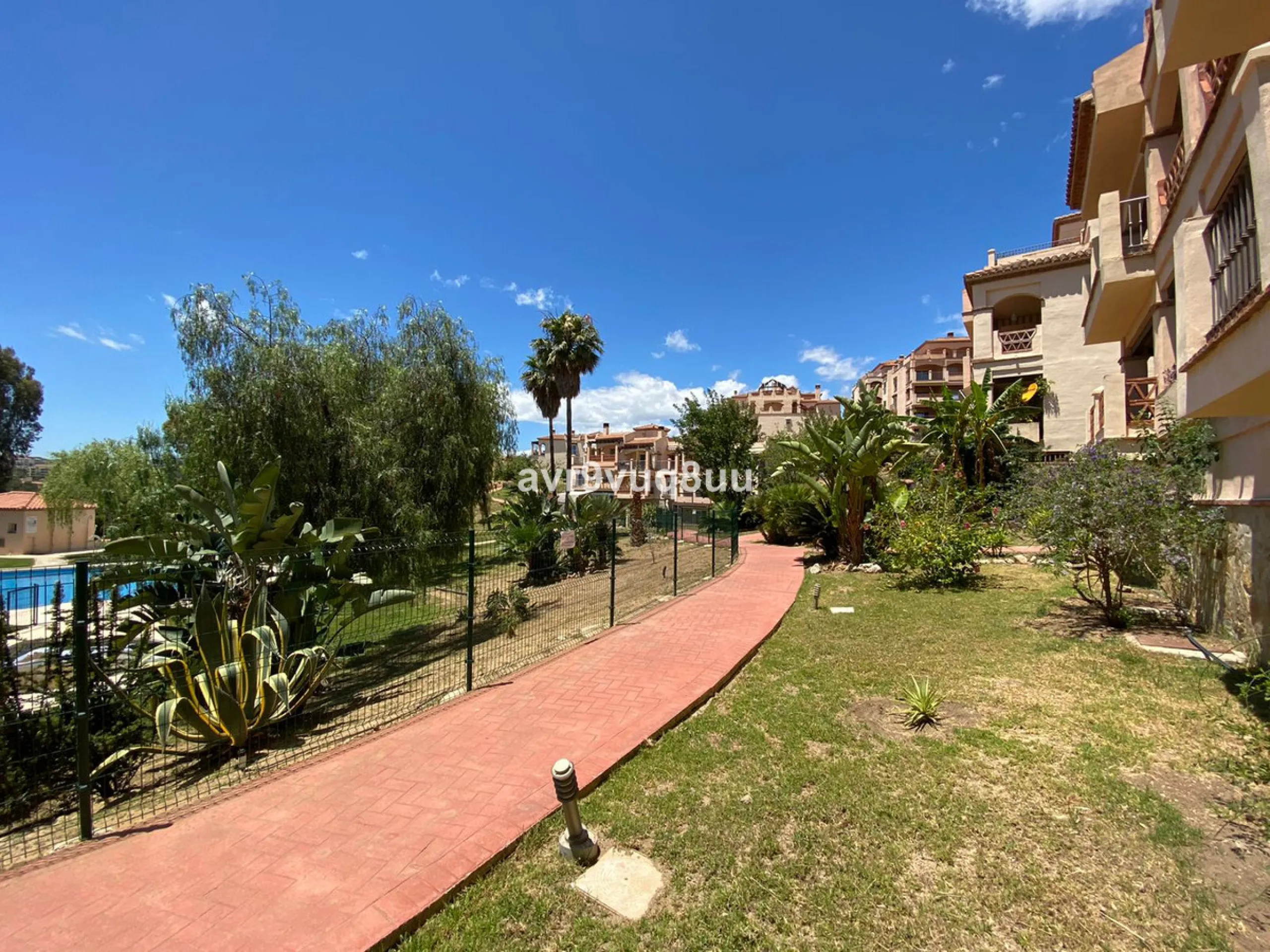A very comfortable home located in the well established urbanisation of Mijas Golf. This spacious house has bright spacious rooms throughout including, on the top floor, a brand new open plan kitchen, lovely lounge diner with fireplace plus a large bedroo