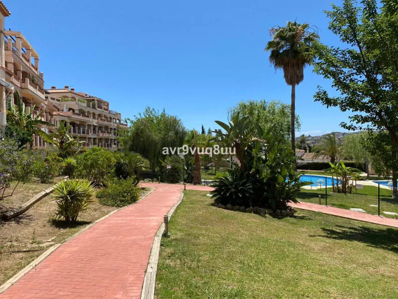 A very comfortable home located in the well established urbanisation of Mijas Golf. This spacious house has bright spacious rooms throughout including, on the top floor, a brand new open plan kitchen, lovely lounge diner with fireplace plus a large bedroo