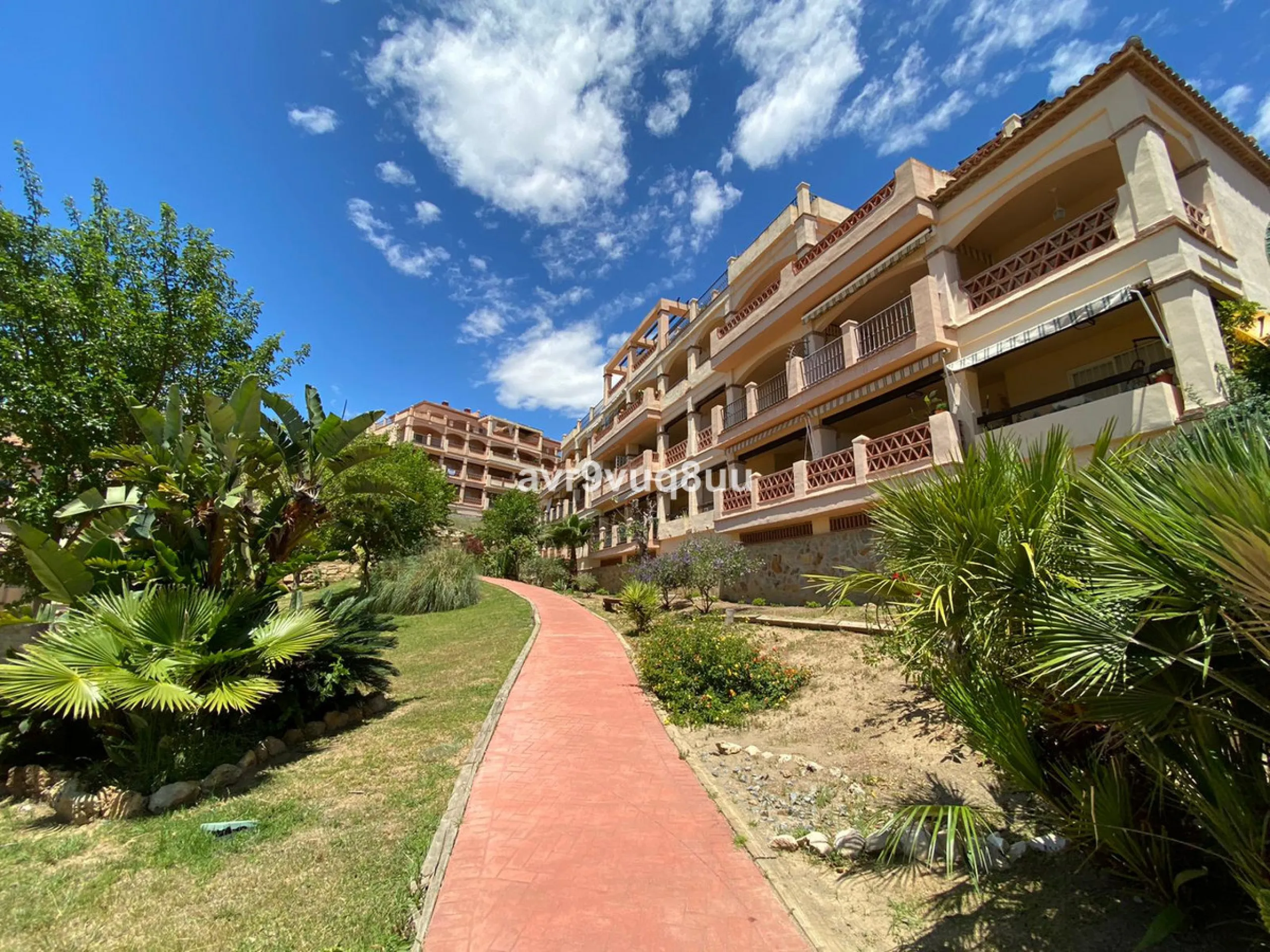 A very comfortable home located in the well established urbanisation of Mijas Golf. This spacious house has bright spacious rooms throughout including, on the top floor, a brand new open plan kitchen, lovely lounge diner with fireplace plus a large bedroo