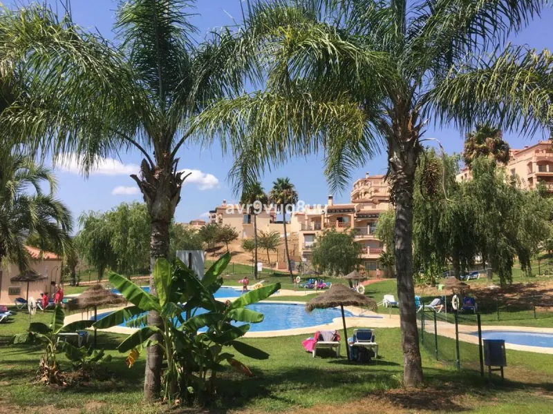 A very comfortable home located in the well established urbanisation of Mijas Golf. This spacious house has bright spacious rooms throughout including, on the top floor, a brand new open plan kitchen, lovely lounge diner with fireplace plus a large bedroo