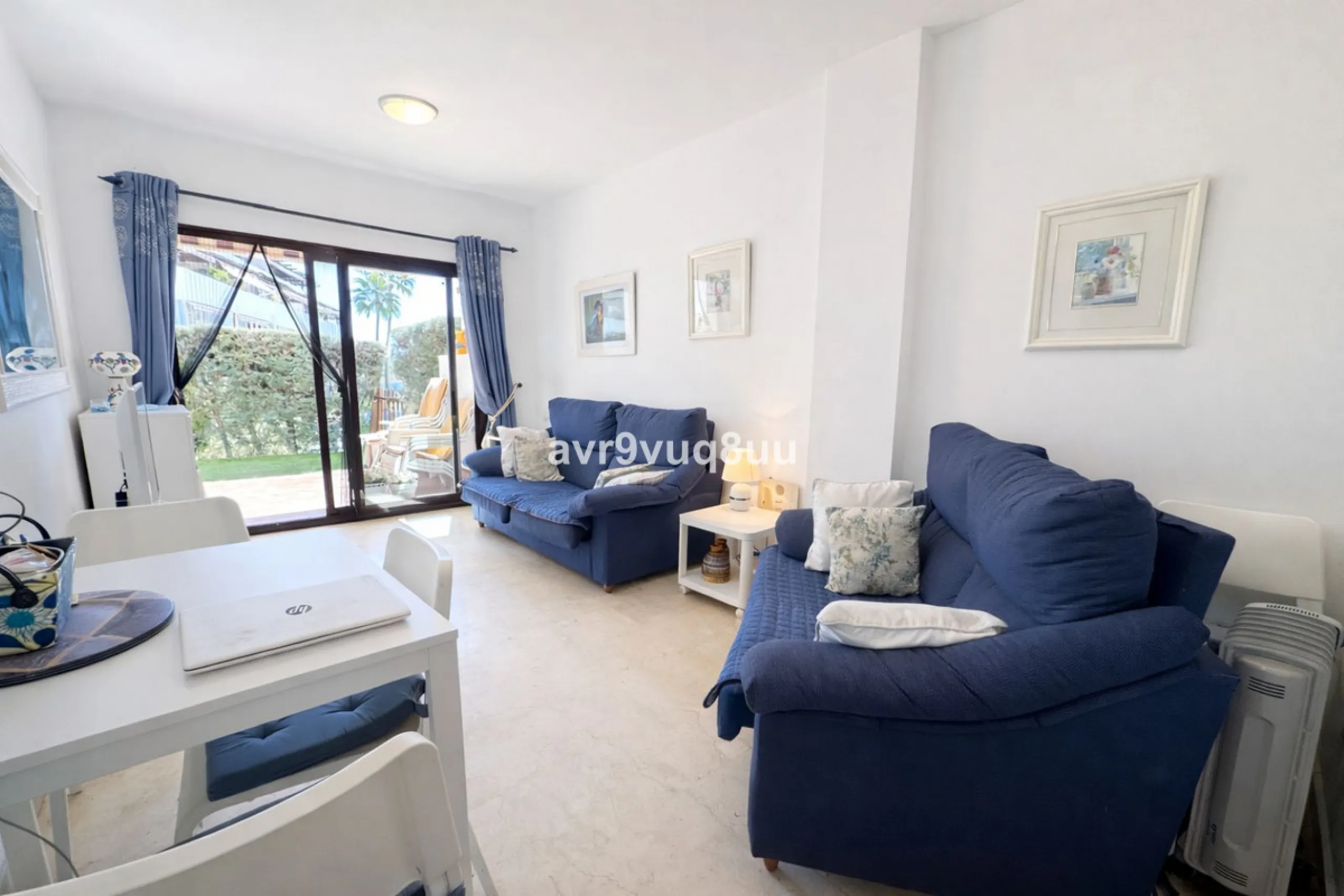 Ground floor apartment in a well established complex in the heart of Riviera del Sol. Large bright lounge diner with access to the closed sunny terrace and large private garden.  Views over the communal gardens and paddle courts. Ample bedrooms with built